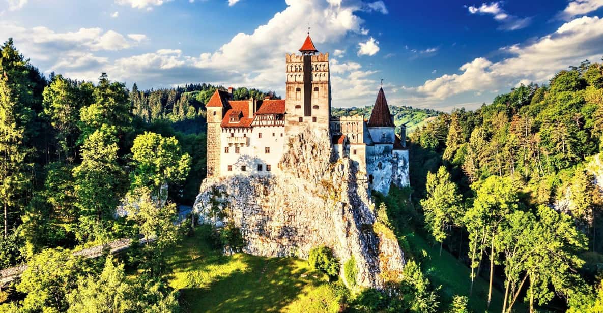 Bucharest: Peles Castle, Bran Castle, & Brasov Old Town Tour - Sinaia and Peleș Castle: royal rooms and serious detail in the 90 minutes