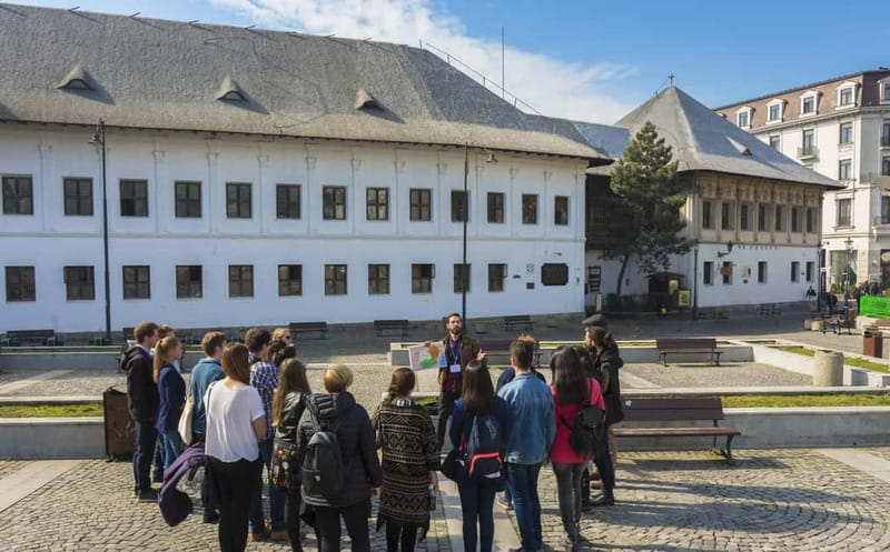 Bucharest: Tour of Old Town, Calea Victoriei & Communism - Starting at the Romanian Athenaeum: your city compass