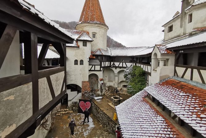 Dracula's Castle, Follow the legend in Transylvania, private tour from Bucharest - Brasov Historical Center: medieval streets with a mountain backdrop