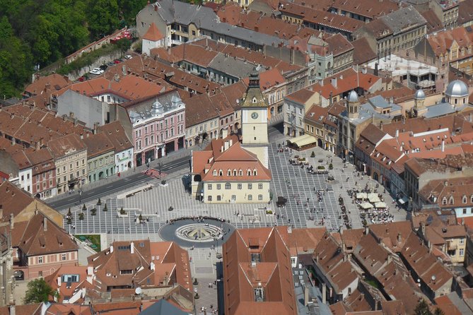 Dracula's Castle & Peles Palace Tour from Bucharest Including Brasov Old Town - Dracula’s Castle (Bran Castle): medieval walls, 60-meter rock views, and an hour to think