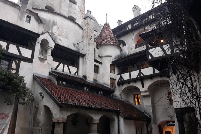 Dracula's Castle & Peles Palace Tour from Bucharest Including Brasov Old Town - Brasov Historical Center: walking plus car-based highlights, ending with Black Church energy