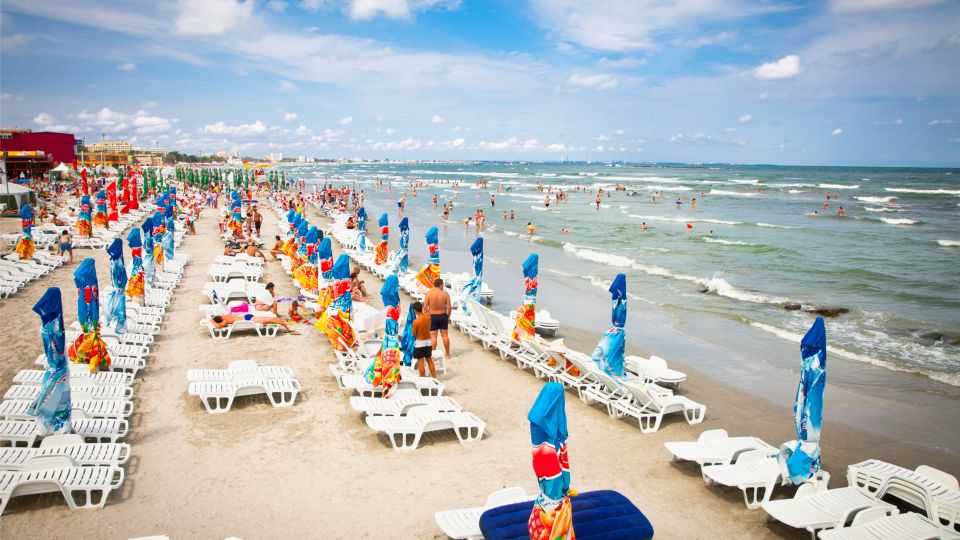 From Bucharest: Full-Day History, Sun & Fun at the Black Sea - Mamaia Beach Resort: Sun Tan Time Done Right