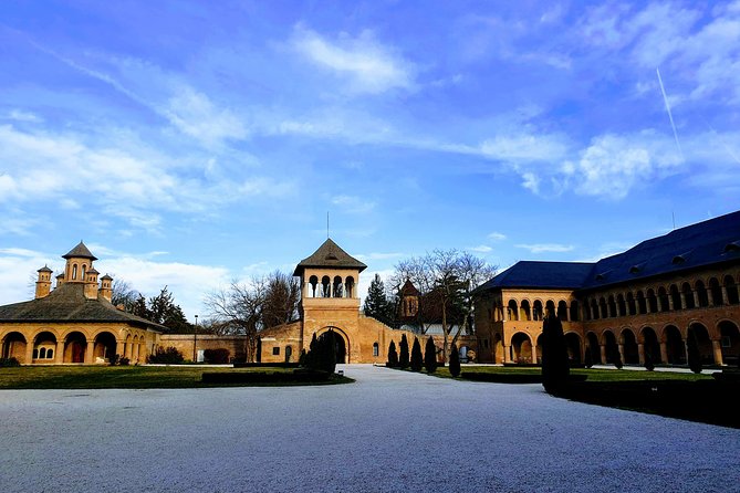 Mystical Monasteries, Dracula's Tomb and Mogosoaia Lake Palace - Private Tour - Caldarusani Monastery on its lake: Orthodox architecture plus language history