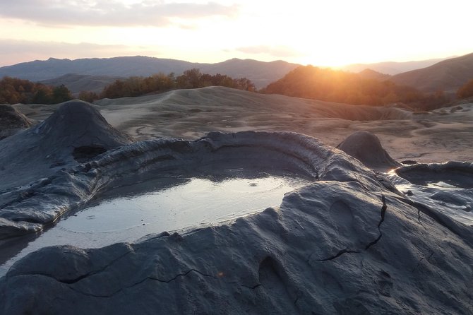 Salt Mine, the Muddy Volcanoes and Wine Tasting Private Day Tour from Bucharest! - Vulcanii Noroiosi muddy volcanoes: bubbling geothermal oddity with photo ops